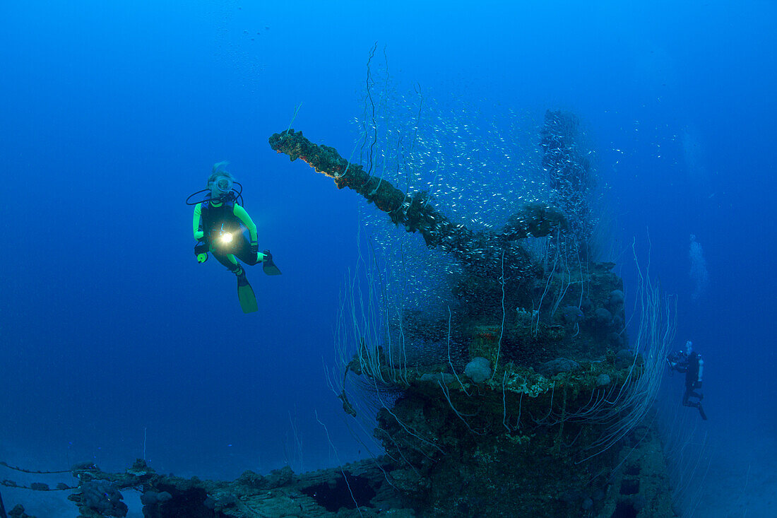 Diver and 5-inch Deck Gun of USS Apogon Submarine, Marshall Islands, Bikini Atoll, Micronesia, Pacific Ocean