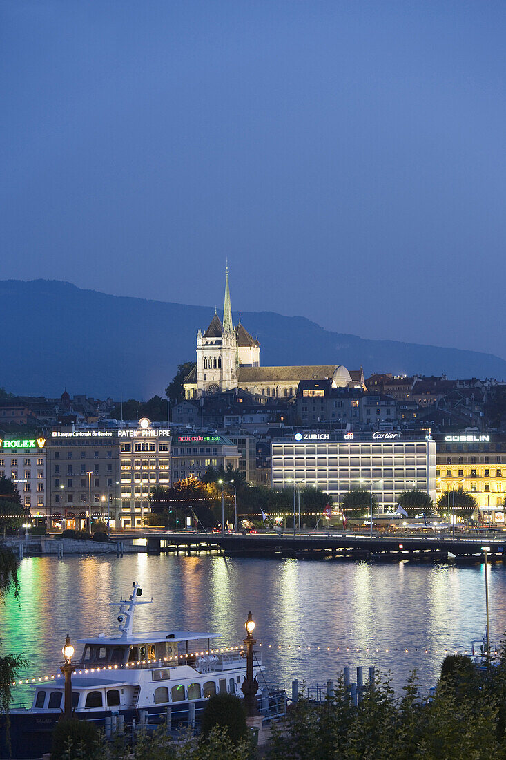 Lake Geneva at night with view of Geneva and the St. Pierre Cathedral, Geneva, Canton of Geneva, Switzerland