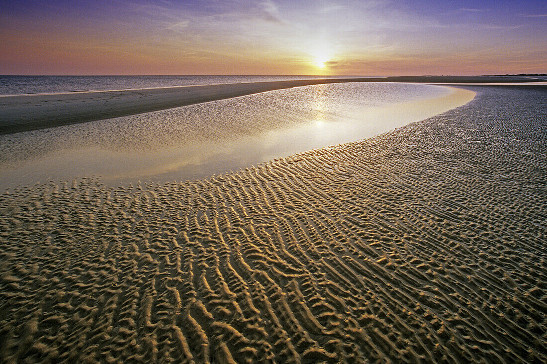 Sunset at Kniepsand beach, Amrum island, Schleswig-Holstein, Germany