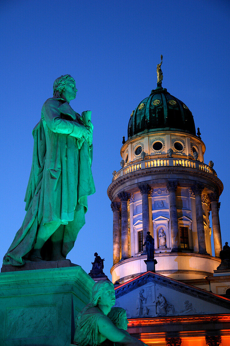 French Cathedral and Schiller statue at night, Gendarmenmarkt, Berlin, Germany