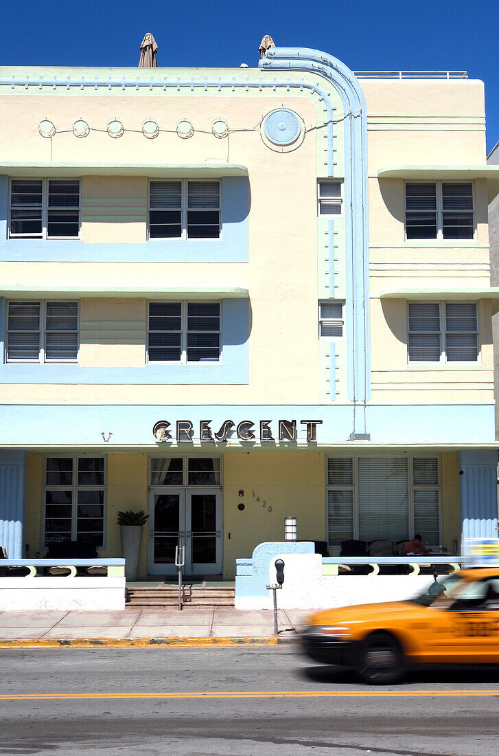 The Crescent Hotel on Ocean Drive in the sunlight, South Beach, Miami Beach, Florida, USA