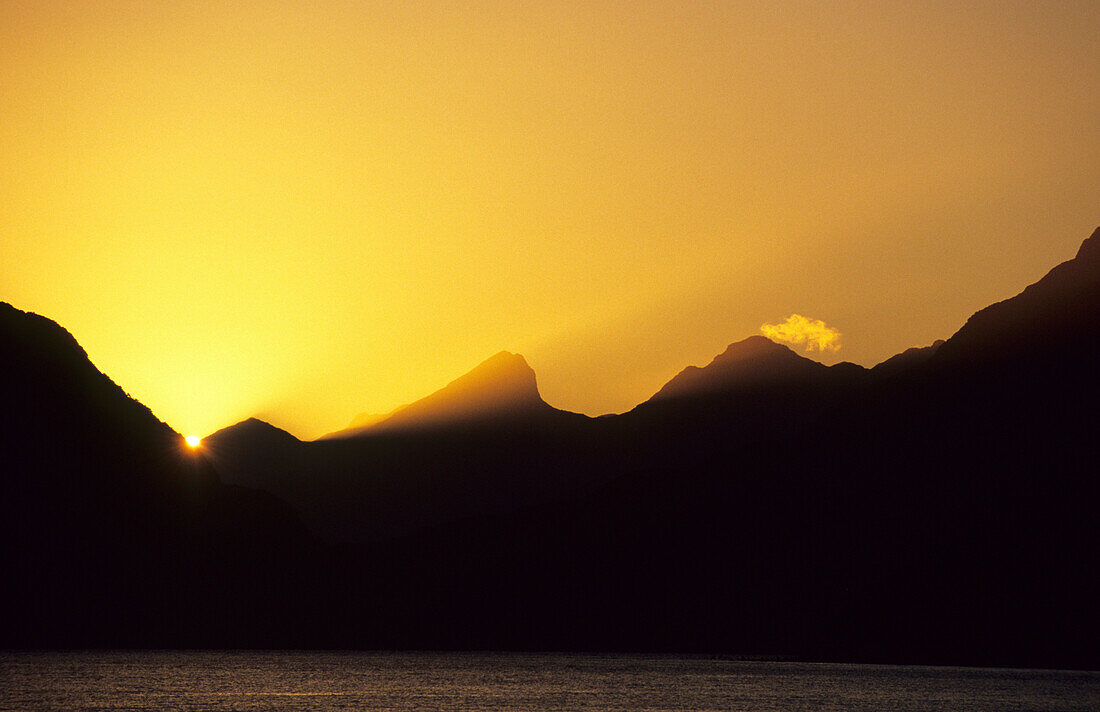 View over Lake Manapouri at the Kepler Mountains at sunrise, Fiordland National Park, South Island, New Zealand, Oceania