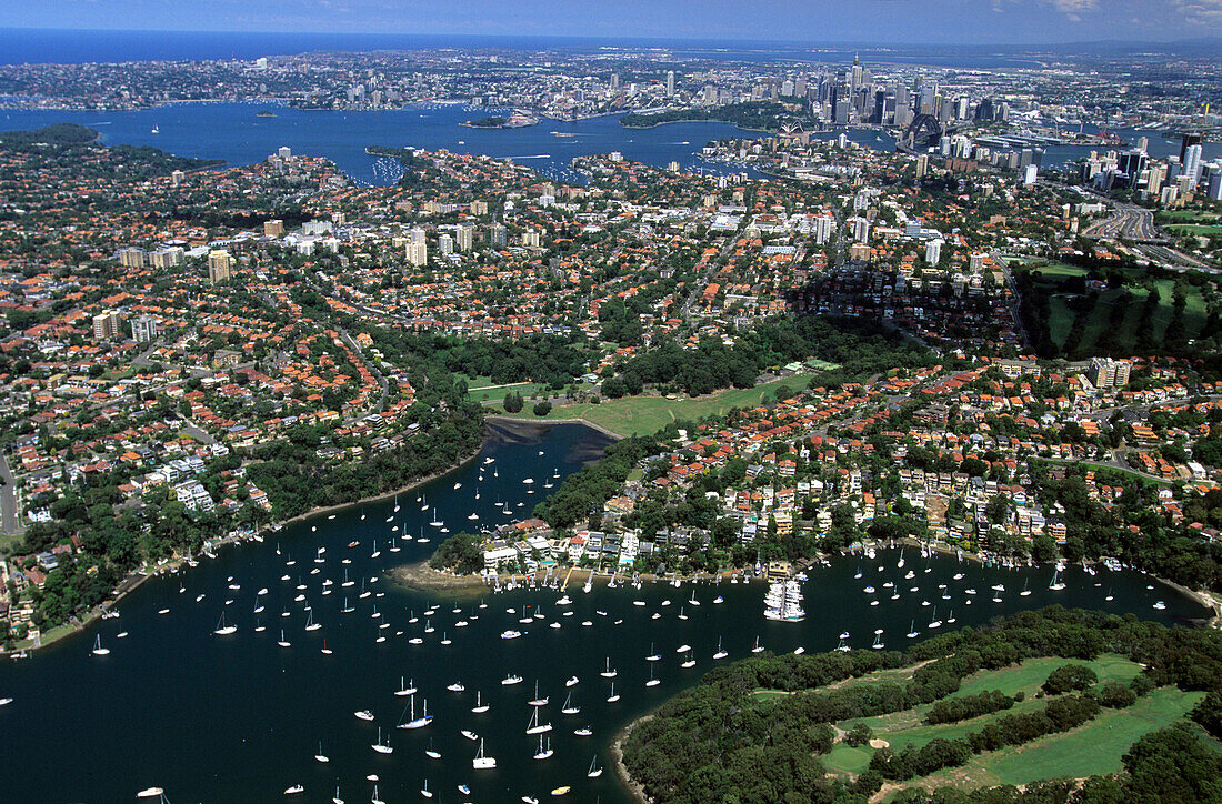 View over Middle Harbour and the surrounding suburbs to the city, Sydney, New South Wales, Australia