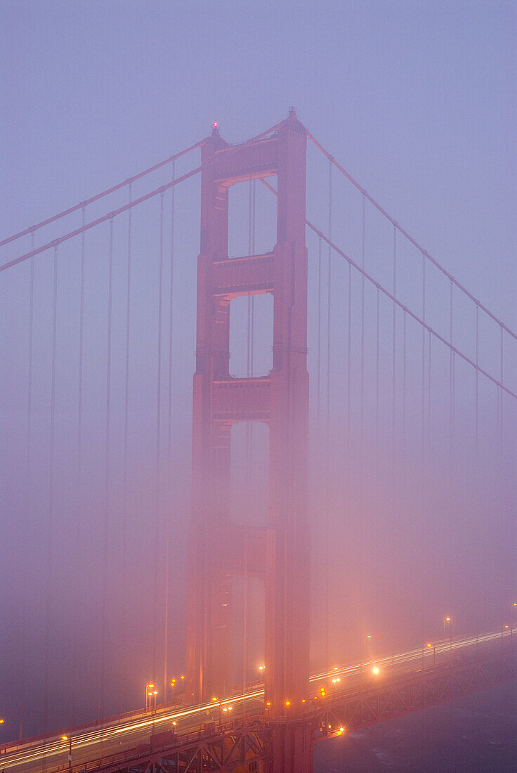 Golden Gate Bridge obscured by fog, San Francisco. California, USA