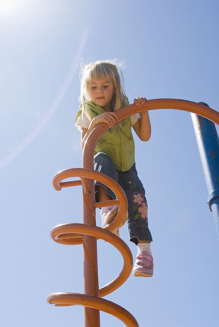 At the playground. 4 year old girl.  White Rock, BC Canada