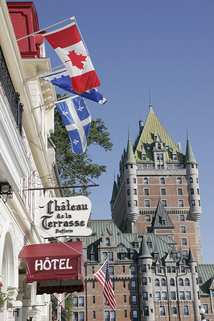 Canada, Quebec City, Upper Town, Place Terrasse_Dufferin, Fairmont Le Chateau Frontenac Hotel, built 1893 1899, flags
