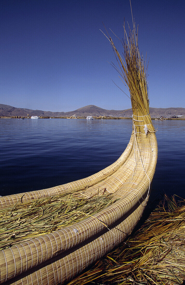 Reed Boat on Uros floating Islands. Lake Titicaca, Puno, Peru