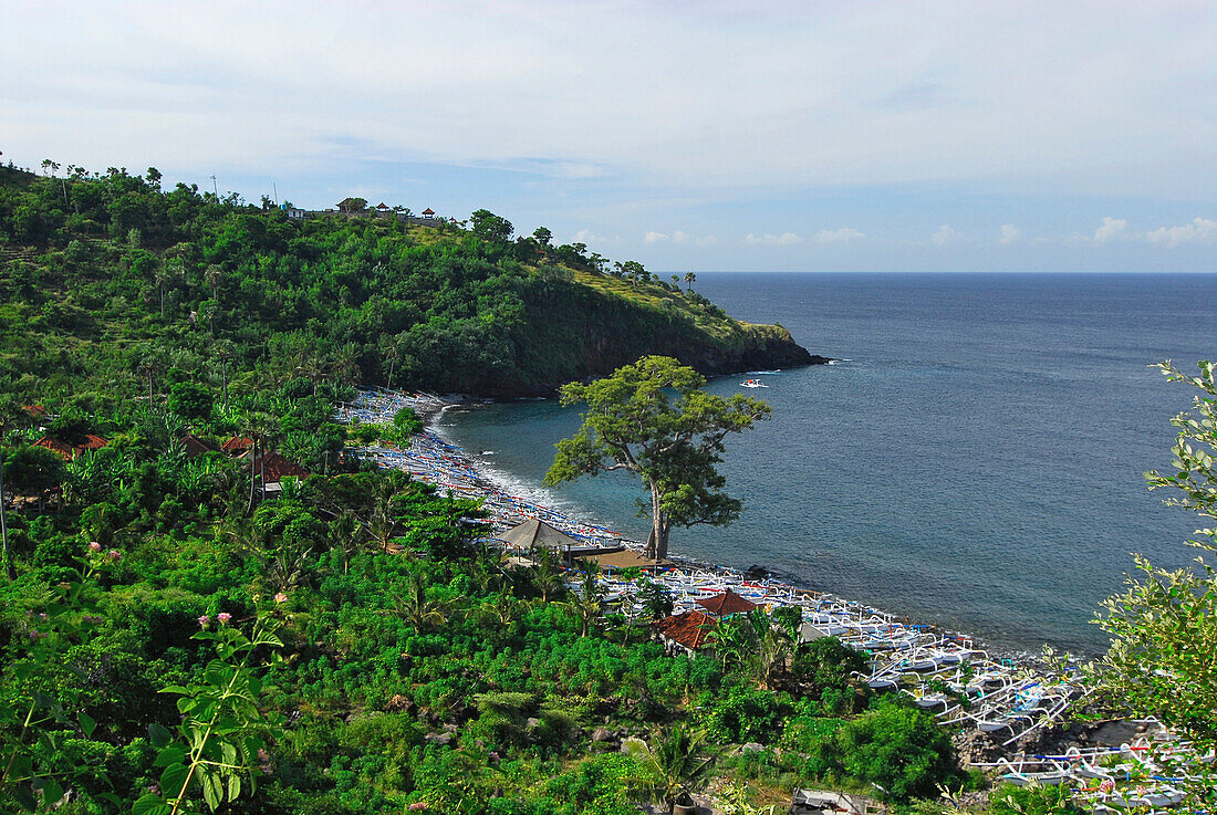 Coastline under cloudy sky, Eastern Bali, Indonesia, Asia