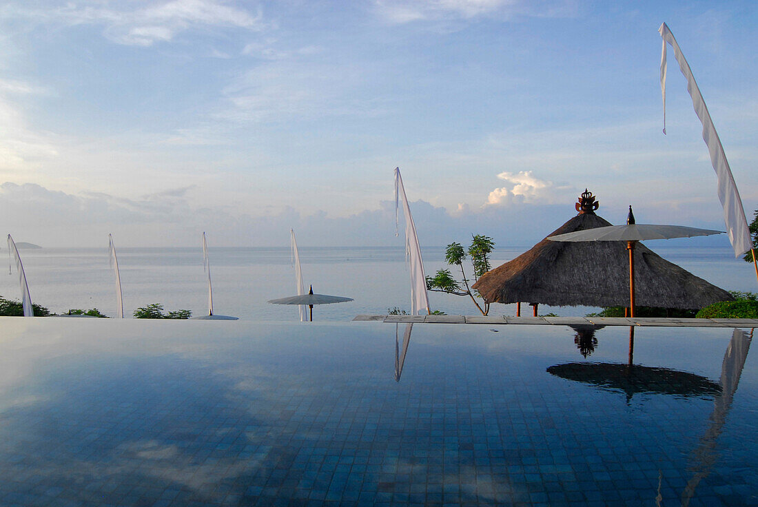 The infinity pool at the Amankila Resort in the morning, Candi Dasa, Eastern Bali, Indonesia, Asia