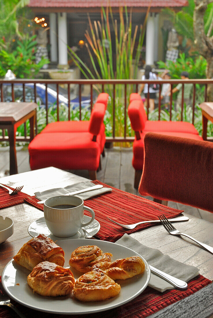 A table is laid out for breakfast at Kuta Seaview Hotel, Restaurant Rosso Vivo, Kuta, Bali, Indonesia, Asia