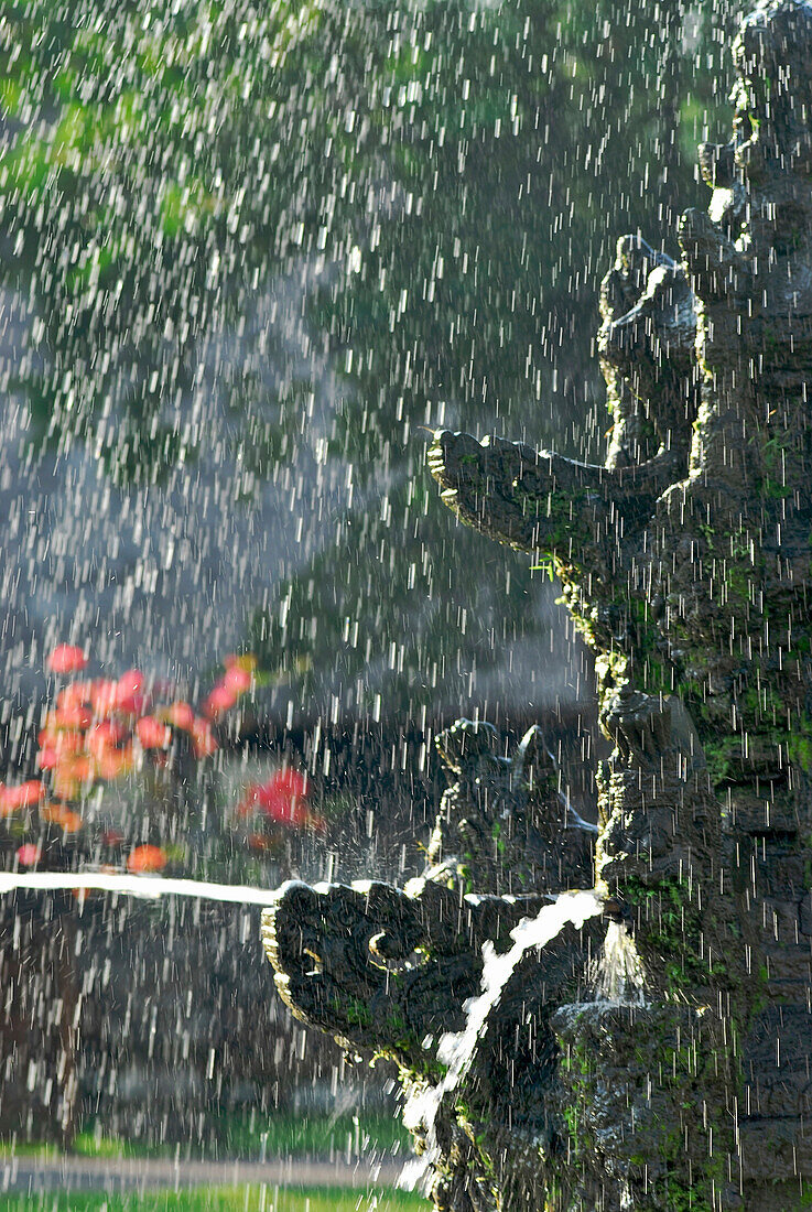 Backlit fountain with figures, Taman Ayun, Mengwi, South Bali, Indonesia, Asia