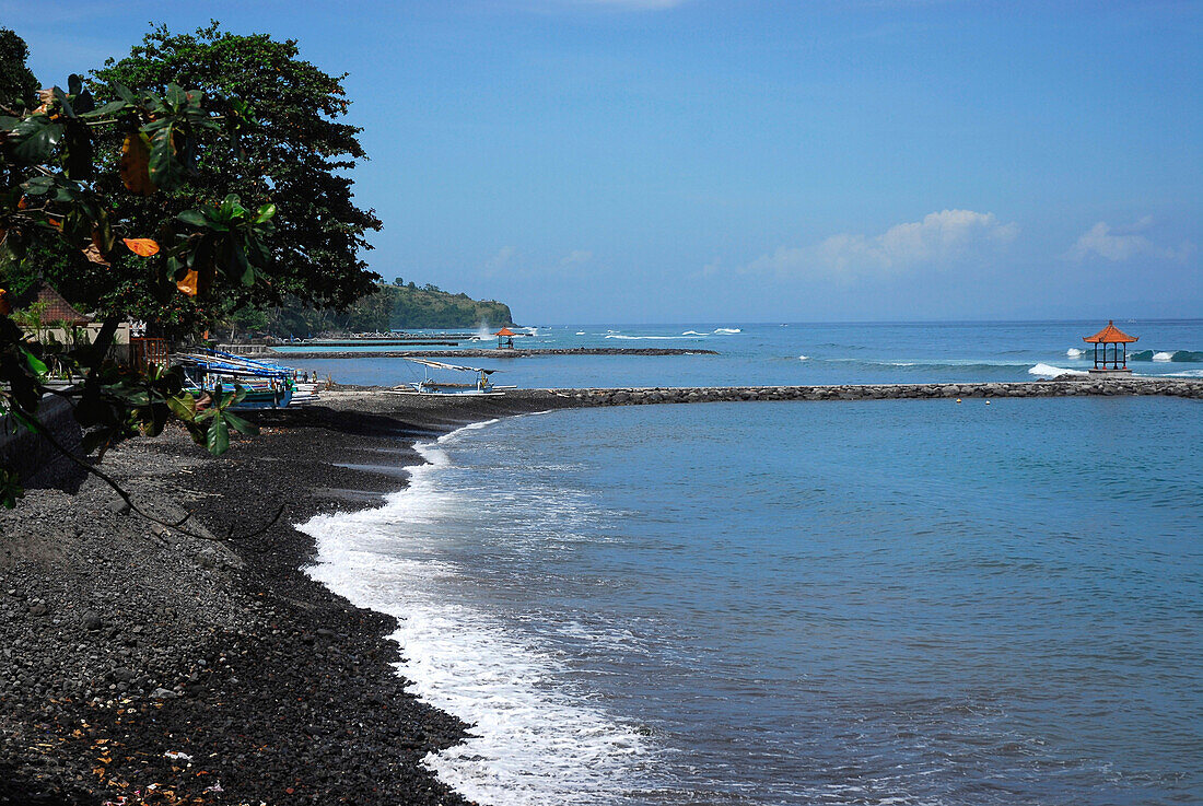Stony beach at the coast at Candi Dasa, East Bali, Indonesia, Asia