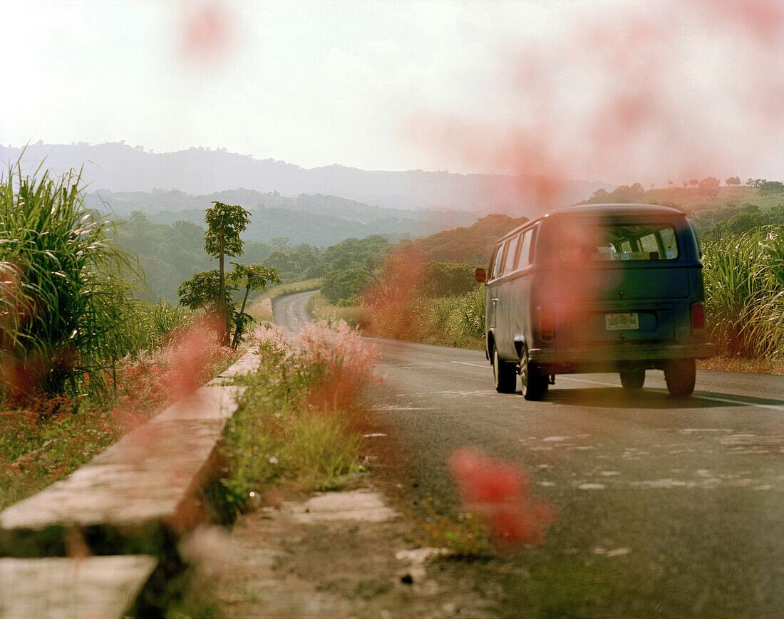 Van driving on a country road, Veracruz province, Mexico, America