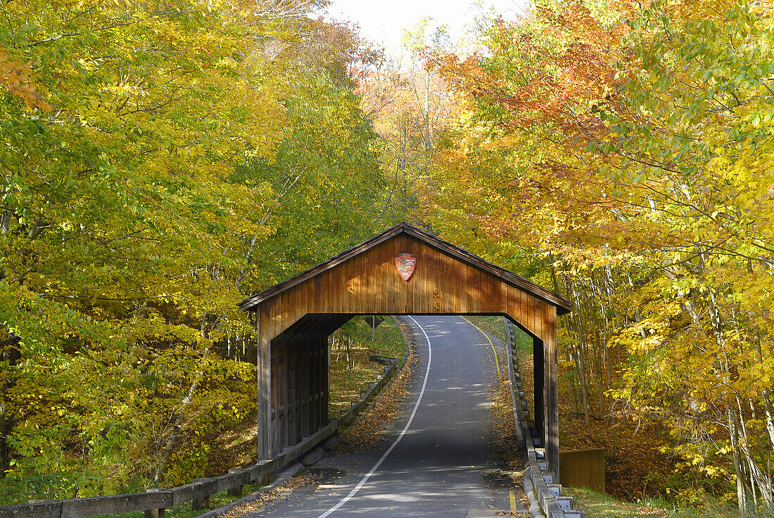 Wooden covered bridge on the Pierce Stockling Scenic Drive during Autumn fall color foliage in the Sleeping Bear Dunes National Park along the shores of Lake Michigan on Michigan s western shore