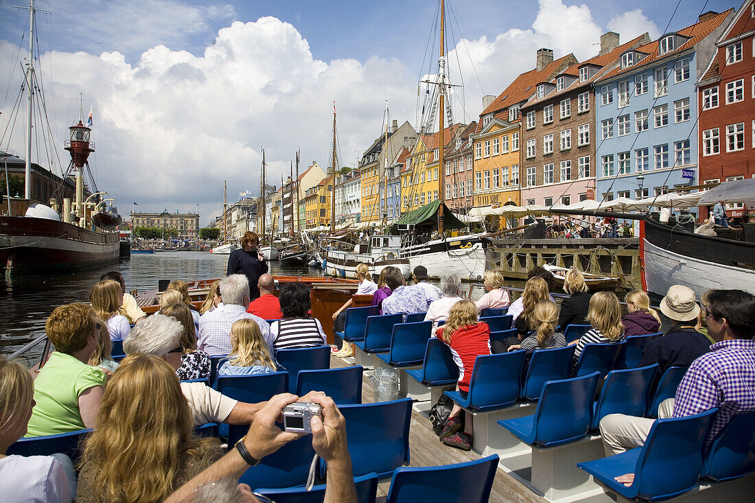 Tourist boat at Nyhavn canal. Copenhagen. Denmark