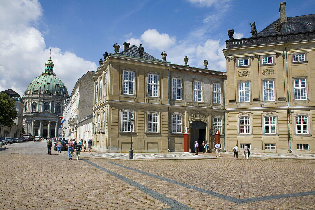 Amalienborg Palace, the winter residence of the Danish royal family and the Frederiks Kirke in background. Copenhagen. Denmark