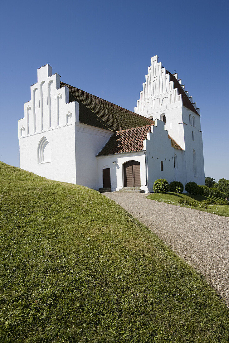 Kirkegardsudvalged church with burial mound. Hijertebjerg. Denmark