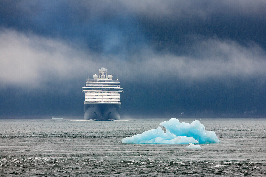 Cruiseship approaching a little iceberg, Inside Passage, Alaska, USA