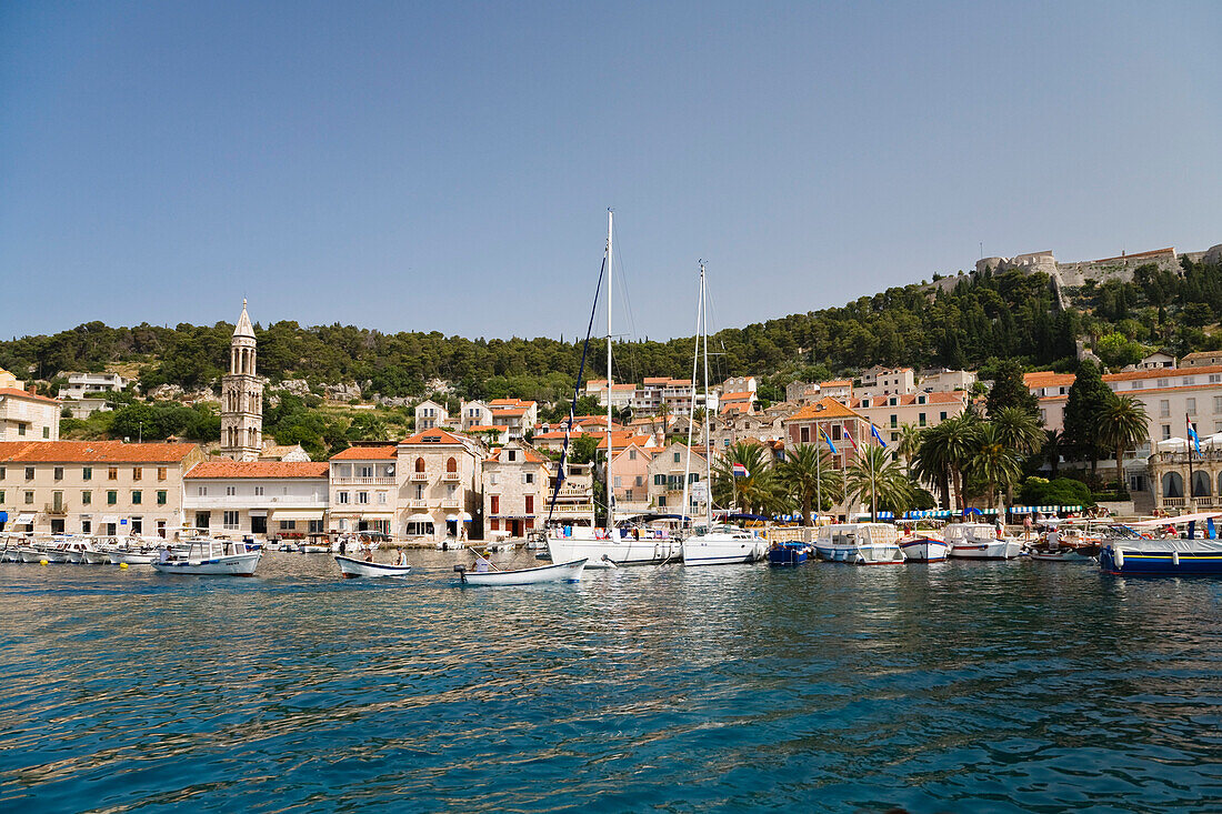 Boats and the harbour of Hvar under blue sky, Hvar Island, Dalmatia, Croatia, Europe