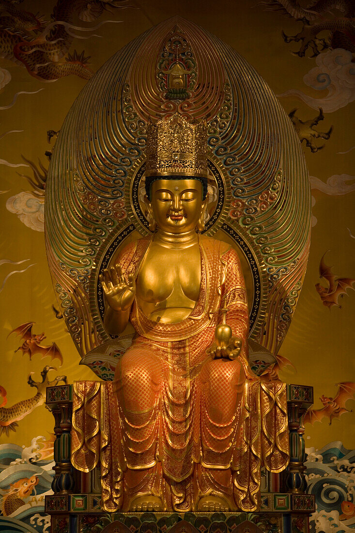 Buddha Statue in 100 Dragons Hall at Buddha Tooth Relic Temple in Chinatown, Singapore, Asia