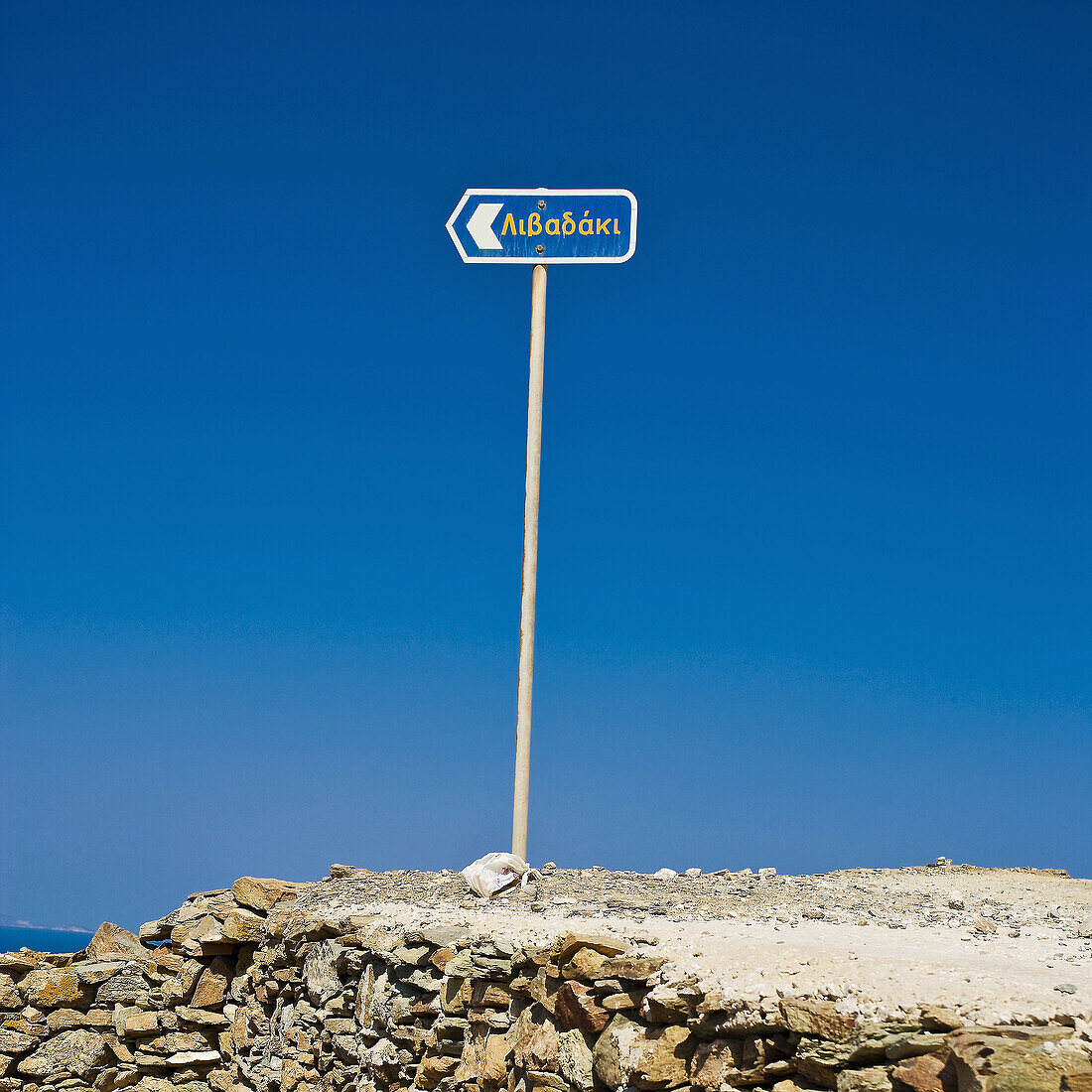 Island of Folegandros, Cyclades, Greece. desolated sign for the beach of Livadaki.
