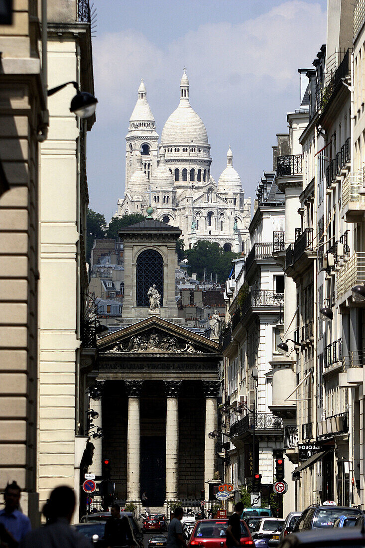 The view of Sacre-Coeur Church from a street. Paris. France