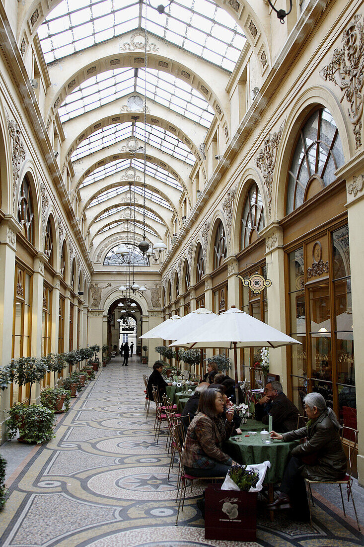 A cafe in the 18th century shopping complex Galerie Vivienne. Paris. France