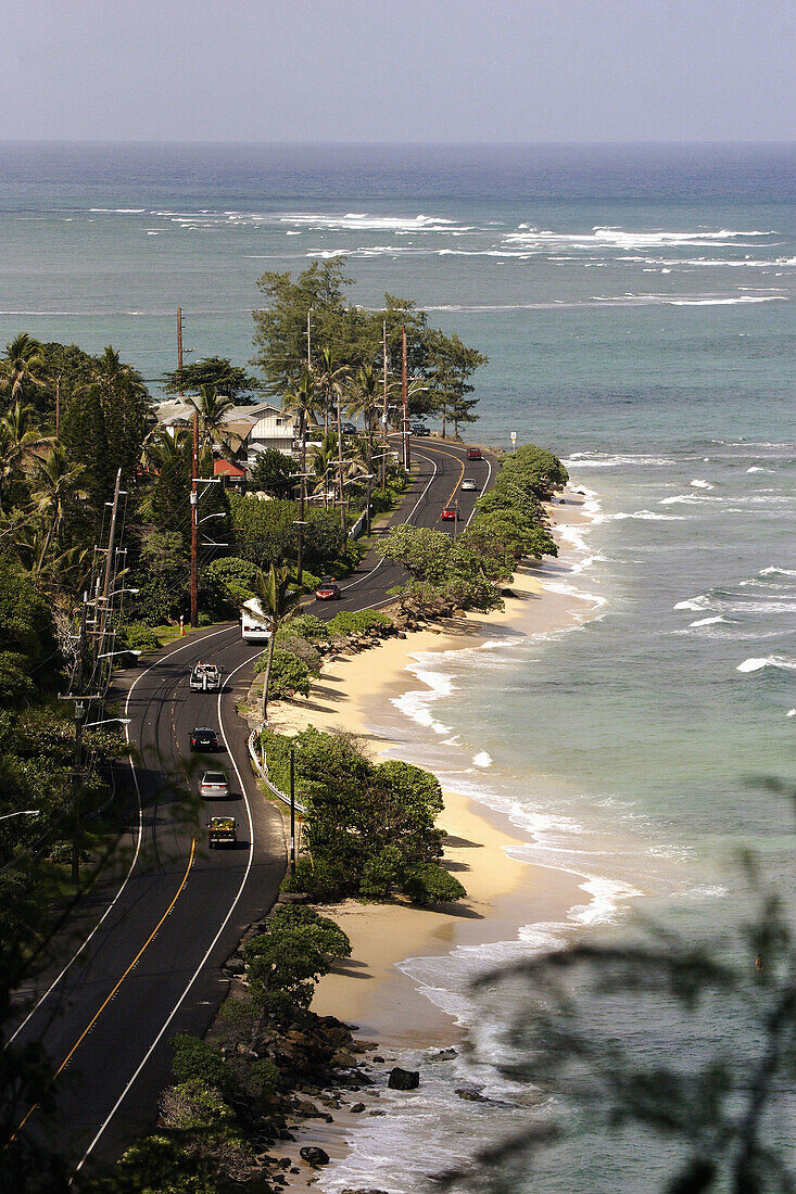 A local highway along sandy beach in East Oahu. Hawaii. USA