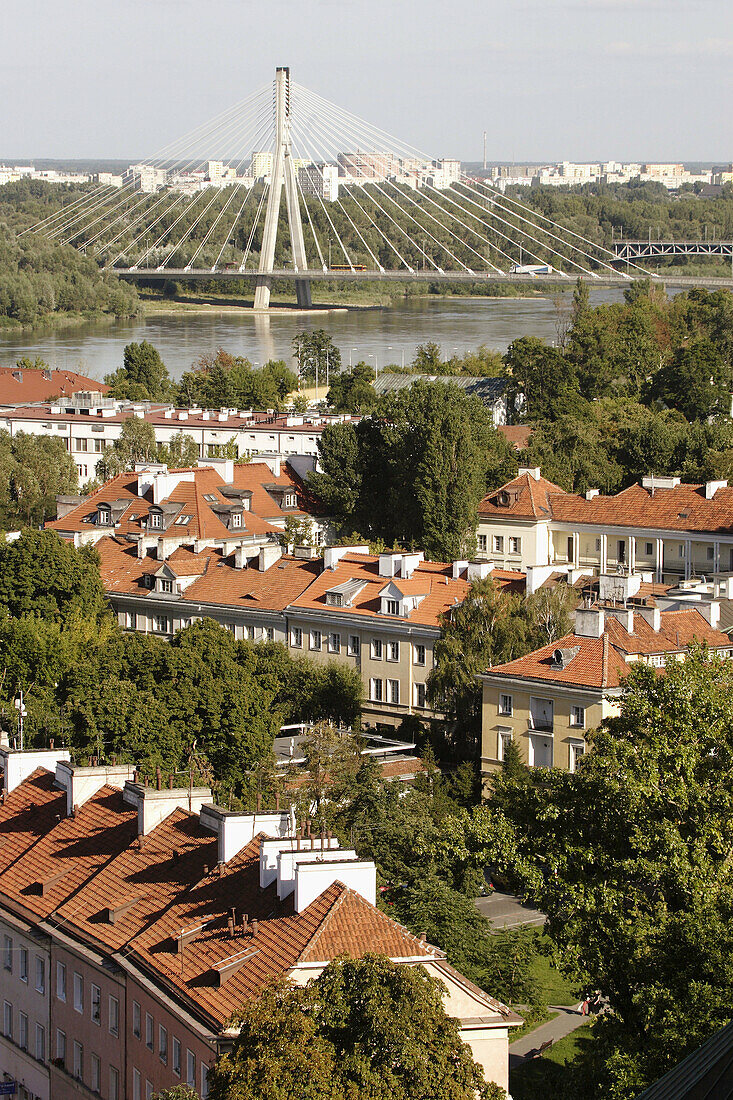 Apartment blocks in Warsaw Old Town with highway bridge in the background. Warsaw. Poland