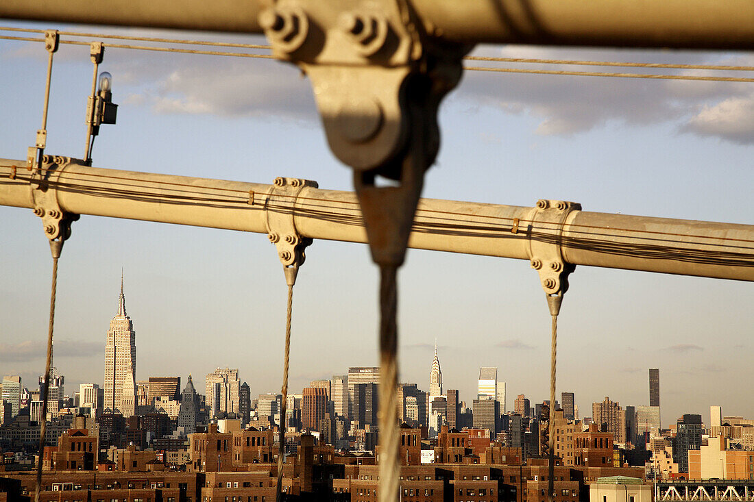 The skyline of New York City from Brooklyn Bridge. New York City. USA