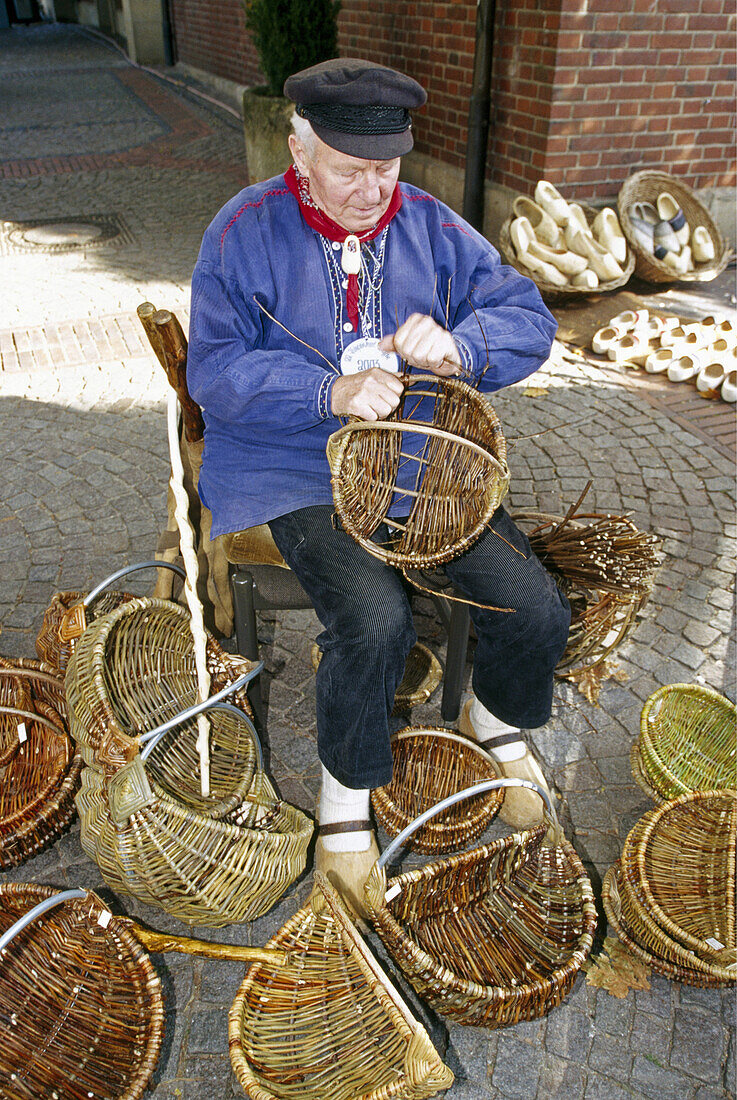 Basket maker at Kiepenkerl-Sunday in Stadtlohn, Muensterland, North Rhine-Westphalia, Germany