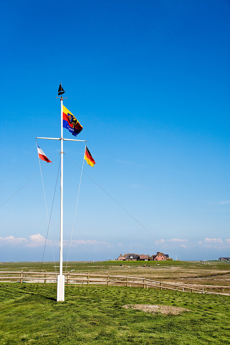 Flagpole at Hooge hallig, North Frisian Islands, Schleswig-Holstein, Germany