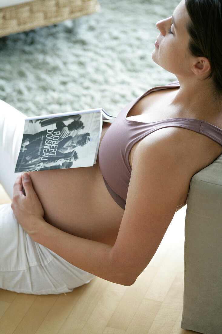 Pregnant woman with closed eyes