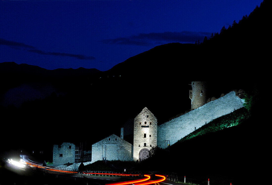 Mühlbacher Klause next to a street at night, Mühlbach, Puster valley, South Tyrol, Italy, Europe