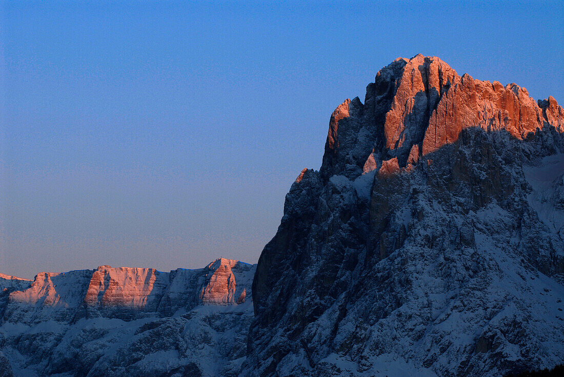 Mountain range under blue sky at sunset, Dolomites, South Tyrol, Italy, Europe