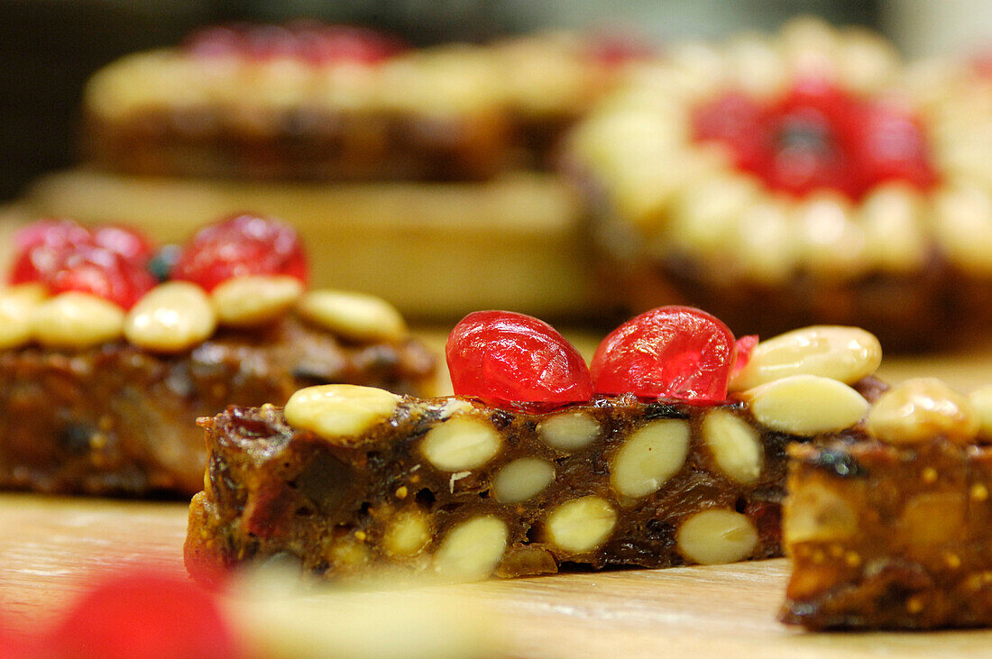 Christmas baking, fruitcake with pine nuts and candied cherries, South Tyrol, Italy, Europe