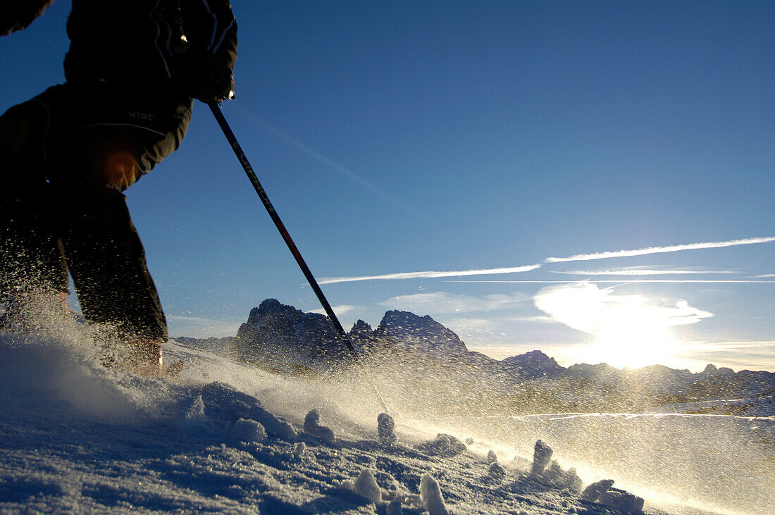 Skier skiing down a slope, Mountain landscape, Seiser Alm, Langkofel mountain range, South Tyrol, Italy