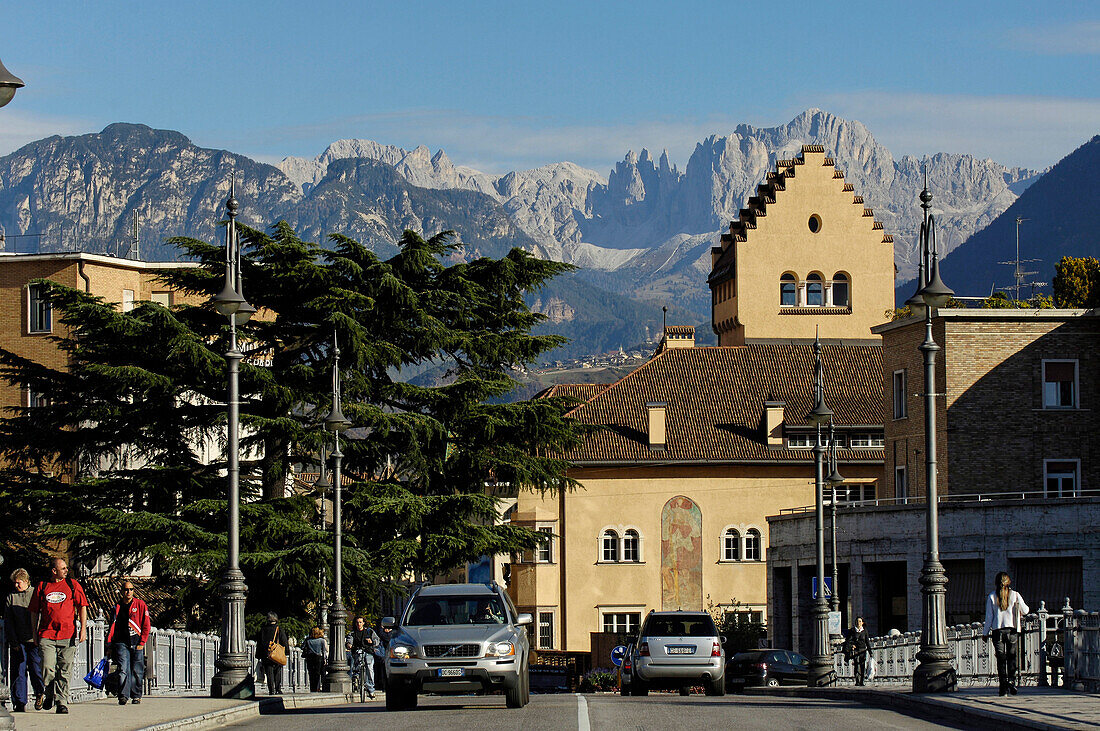 Talfer bridge and city museum, Rosengarten Mountain range in the background, Bolzano, South Tyrol, Italy