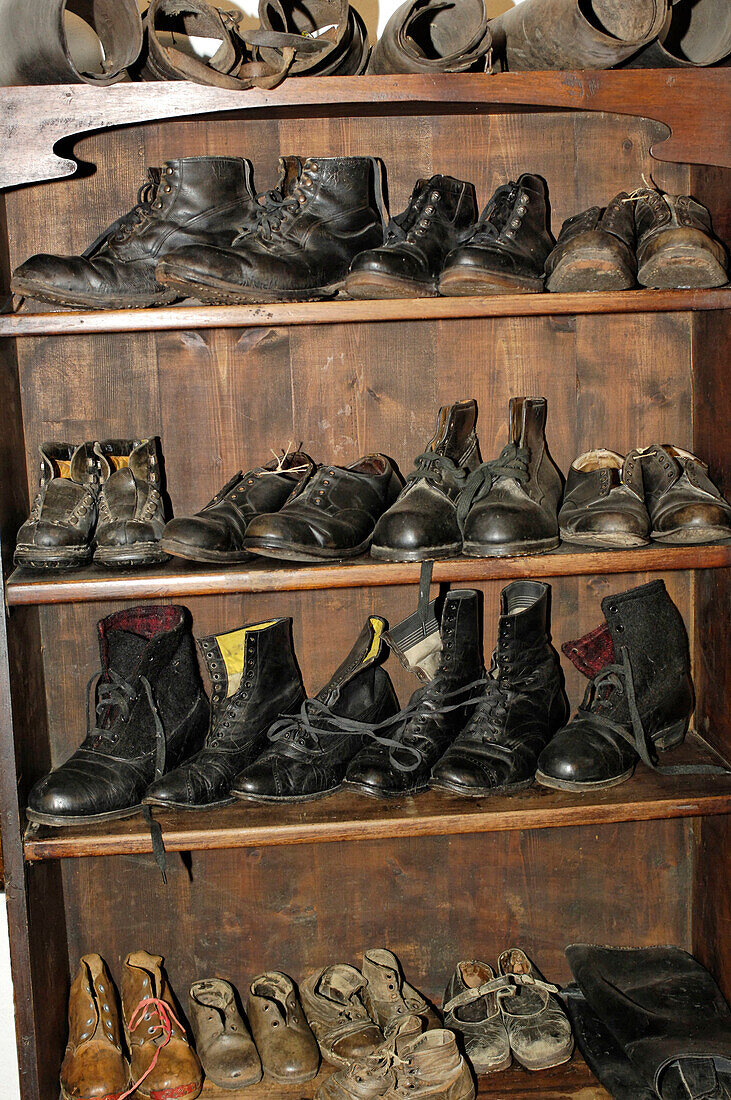 Shoes at the cobblers, South Tyrolean local history museum at Dietenheim, Puster Valley, South Tyrol, Italy