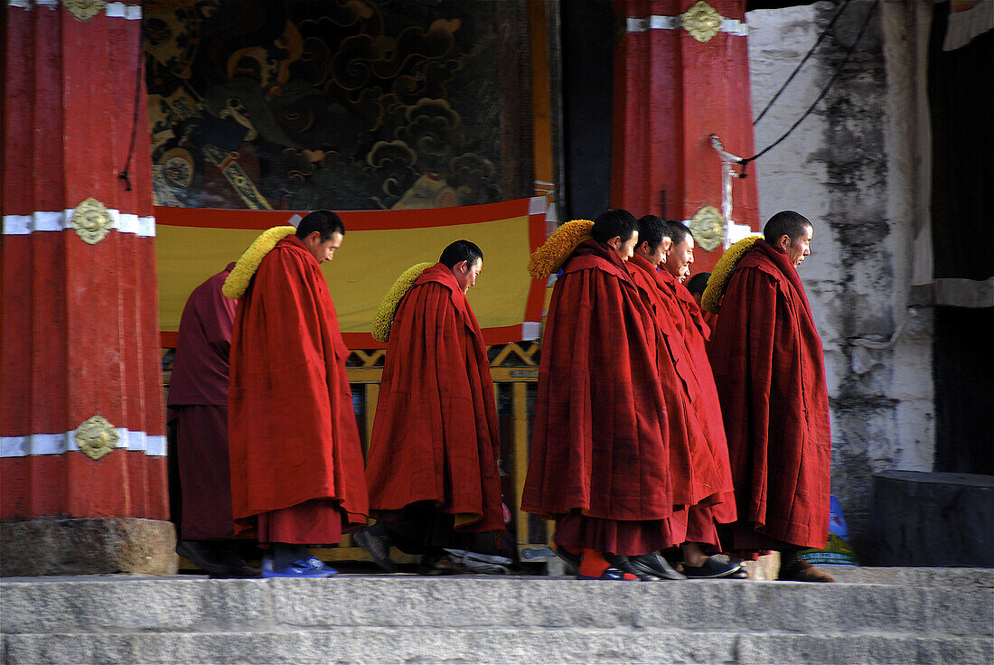 Gelukpa school. Lama going out from a ceremony. Drepung monastery. Lhasa. Tibet