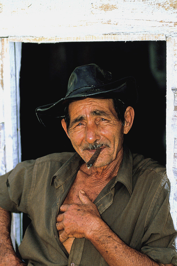 Man smoking cigar, Pinar del Rio. Cuba