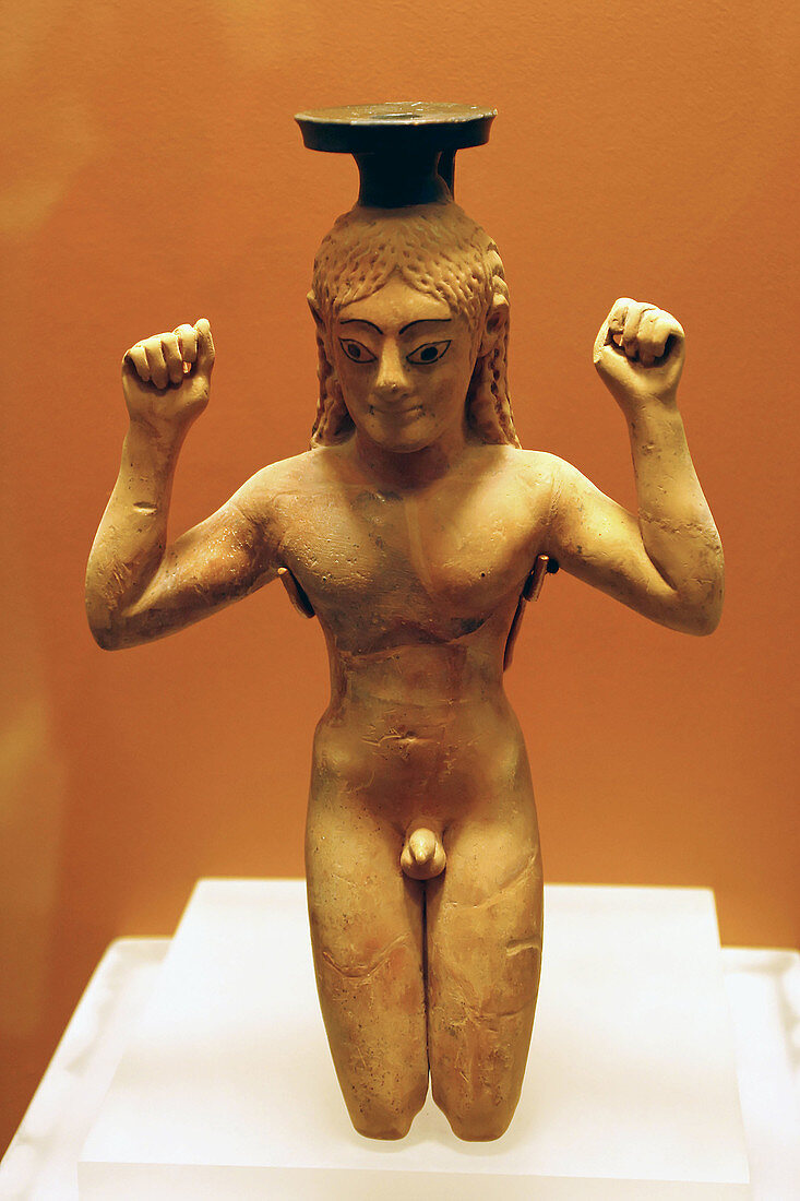 Athlete-shaped bottle of perfume in the Ancient Agora Museum (Stoa of Attalos), Athens. Greece