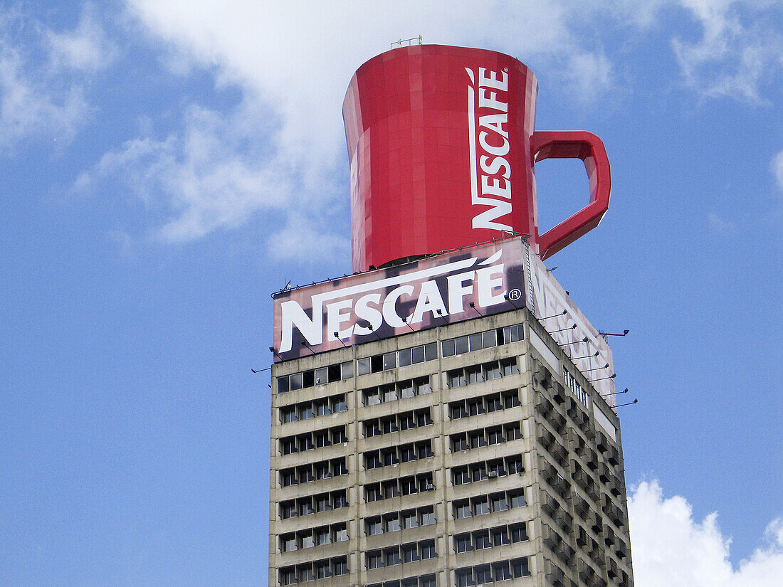 Instant coffee brand ad on the top of a building, Caracas. Venezuela