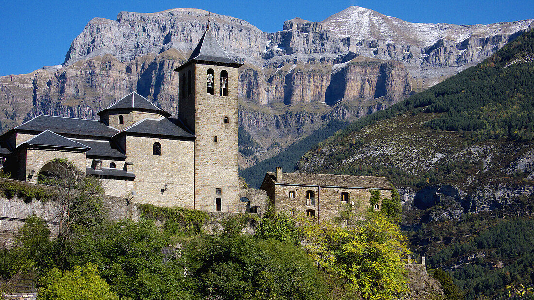 Torla church and paredes de Mondaruego, Ordesa National Park. Huesca province, Aragón, Spain