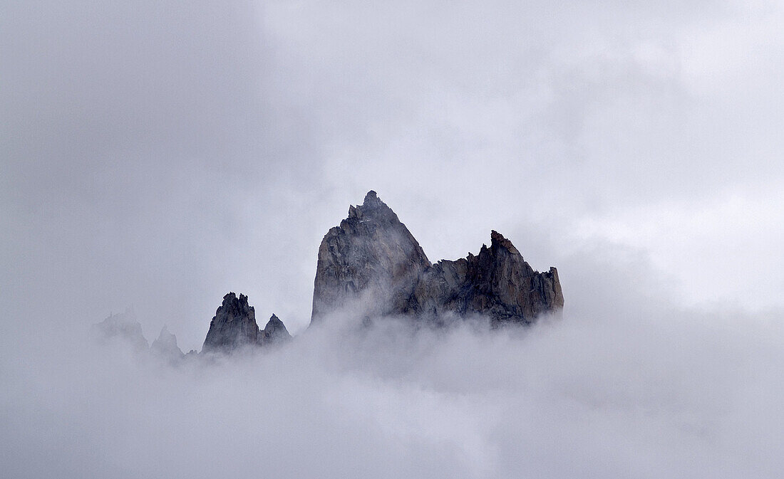 Mountain peaks in the mist, Karakoram Range, Pakistan
