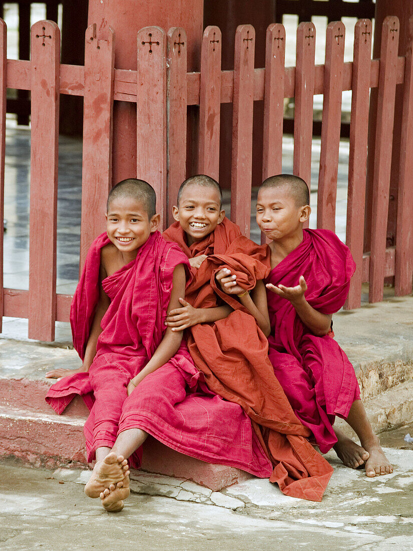 3 Burmese monks playing in Bagan, Myanmar