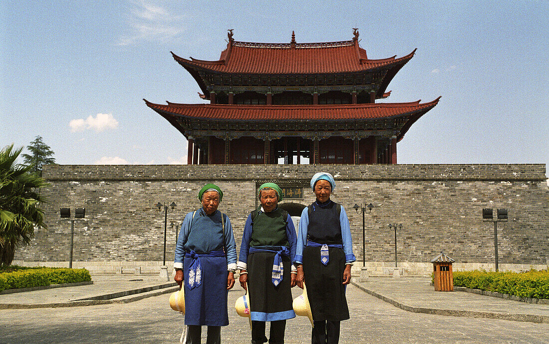 Bai women in front of the Southern gate of the old city of Dali. Yunnan, China