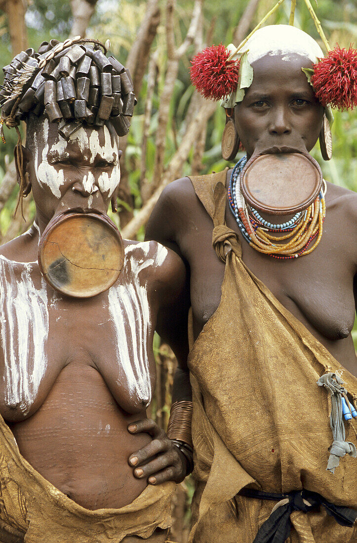 The Surma tribe kept their traditions alive all the way to the 21st century: Surma women are known for wearing the clay / wood plate streaching their lower lip, Ethiopia