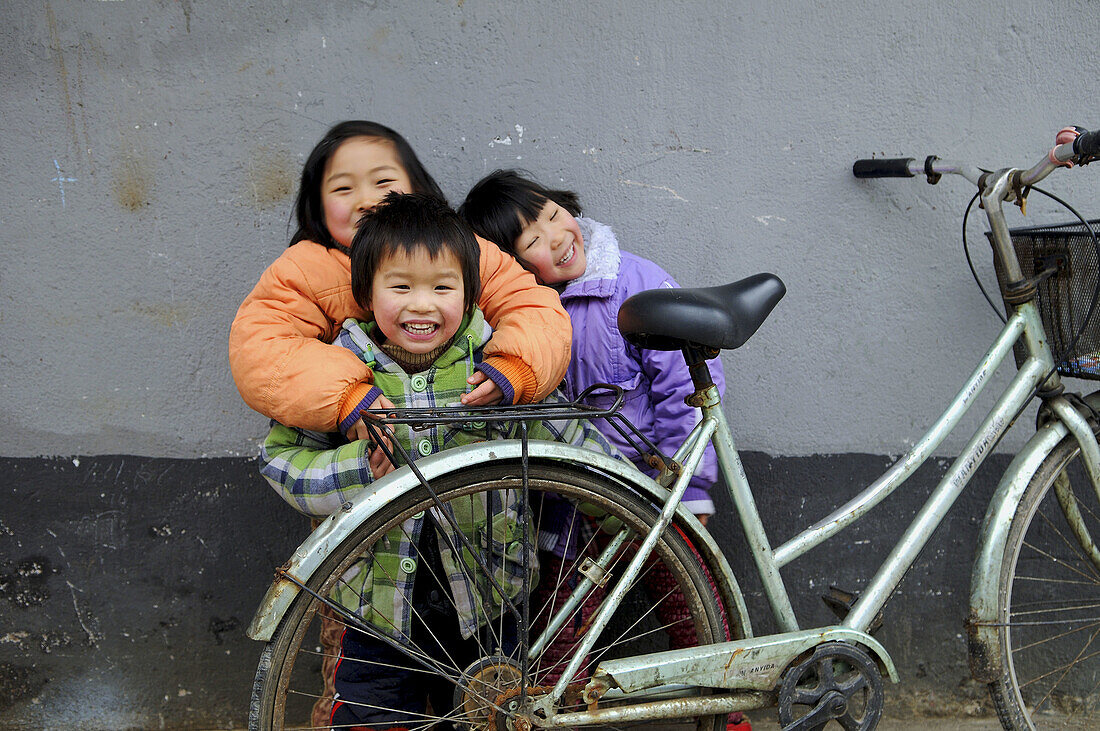 Chinese kids having fun in a cold afternoon  Nanjing, China