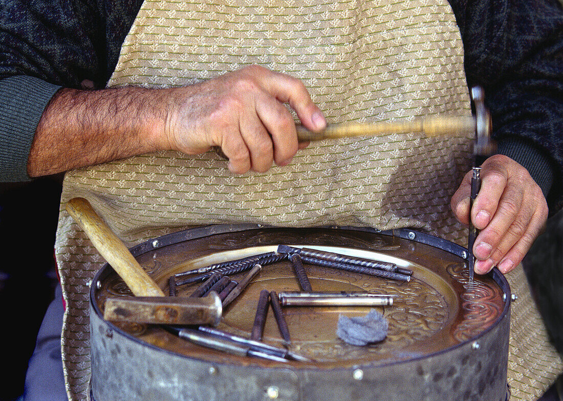 Chiseller Making a Brass Plate.